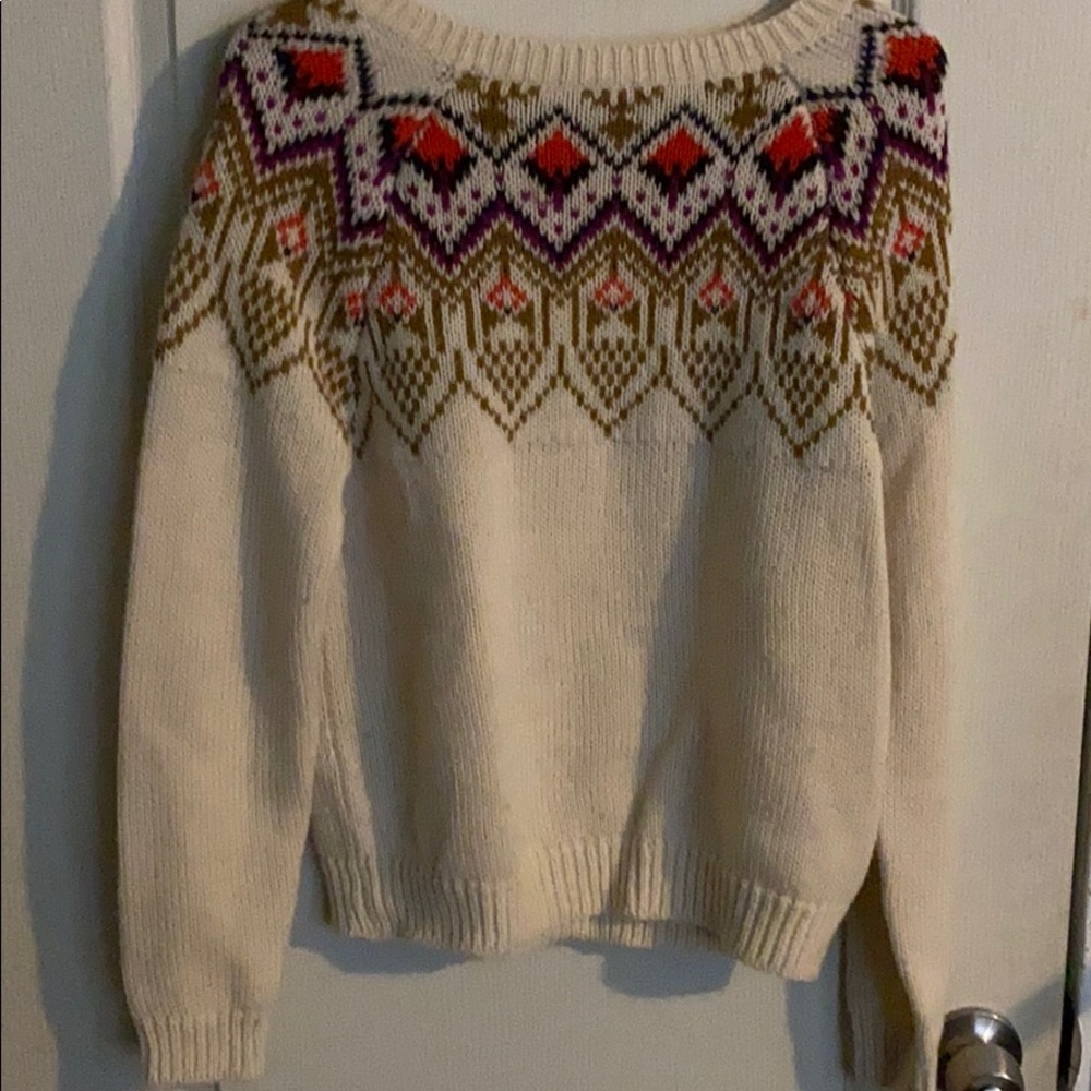 Sweater with cute design on chest area.